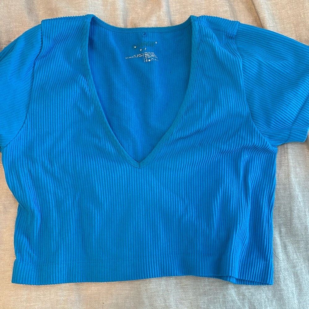 Garage, bright blue crop top/v neck